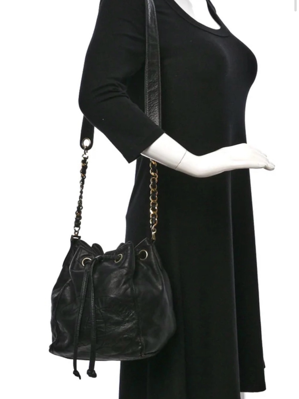 Guaranteed authentic vintage Chanel Lambskin CC Stitched Drawstring Bucket Bag